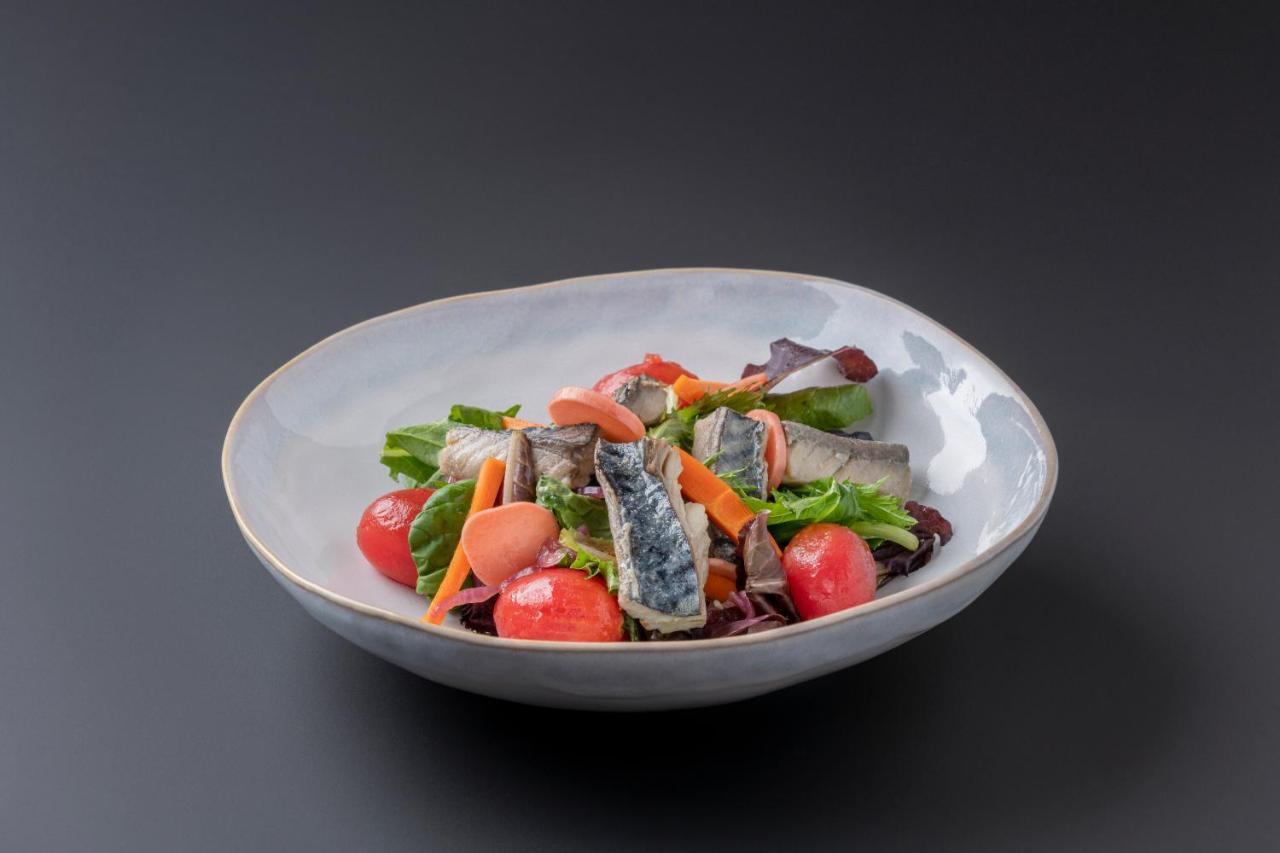 Eurostars Portico Alicante Bagian luar foto A salad with sardines